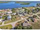 Waterfront homes with boat docks on canals leading to a bay, featuring a scenic residential neighborhood at 3239 Daytona Dr, Punta Gorda, FL 33983