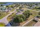 High-angle view exhibiting the property's generous outdoor space, proximity to the water, and lovely neighborhood feel at 3239 Daytona Dr, Punta Gorda, FL 33983