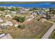 A bird's-eye view of a waterfront community with canal access, highlighting neighborhood homes, docks, and a scenic setting at 3239 Daytona Dr, Punta Gorda, FL 33983