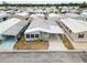 Aerial view of property showcasing its mature landscaping and proximity to neighborhood amenities at 3352 Laurel Oak Way, Sarasota, FL 34237