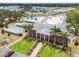 Aerial view of the clubhouse and neighborhood amenities including a pool, tennis and bocce ball courts at 3352 Laurel Oak Way, Sarasota, FL 34237
