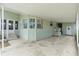 Wide covered patio with ample space for entertaining and enjoying the outdoors at 3352 Laurel Oak Way, Sarasota, FL 34237