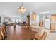 Open-concept living space with kitchen, dining, and living area with great flow and natural light at 3352 Laurel Oak Way, Sarasota, FL 34237