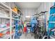 Organized storage area with shelving and a variety of items at 3352 Laurel Oak Way, Sarasota, FL 34237