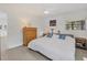 Light and airy bedroom with tile flooring, a ceiling fan, and comfortable decor at 3500 Green View Ct # 45, Sarasota, FL 34231