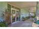 A welcoming entrance with beautiful plants and ample seating at 3500 Green View Ct # 45, Sarasota, FL 34231