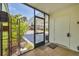 Tile entryway featuring a welcome mat and views of the covered carport at 3500 Green View Ct # 45, Sarasota, FL 34231