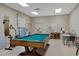 Game room with pool table, providing entertainment for residents at 3500 Green View Ct # 45, Sarasota, FL 34231