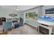 Inviting living room features large windows and a comfortable seating arrangement, ideal for relaxation and gatherings at 3500 Green View Ct # 45, Sarasota, FL 34231