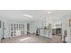 View of the living room showing its open layout and breakfast bar connecting to the kitchen at 3500 Green View Ct # 45, Sarasota, FL 34231