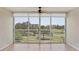 Relaxing lanai with tile floors, ceiling fan, and stunning views of the golf course at 3750 Pinebrook Cir # 405, Bradenton, FL 34209