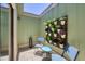 Private outdoor atrium with seating and decorative potted plants at 4079 Woodview Dr, Sarasota, FL 34232