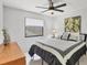 Bright bedroom with ceiling fan and neutral decor at 4079 Woodview Dr, Sarasota, FL 34232