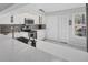 Modern kitchen featuring stainless steel appliances, and white countertops at 4079 Woodview Dr, Sarasota, FL 34232