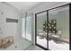 Bright walk-in shower with private atrium access at 4079 Woodview Dr, Sarasota, FL 34232
