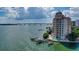 Stunning waterfront condo building with private boat docks and beautiful coastal views of the bay at 420 Golden Gate Pt # 200A, Sarasota, FL 34236