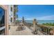 Enjoy the waterfront views from this outdoor living space at 420 Golden Gate Pt # 200A, Sarasota, FL 34236
