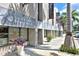 Storefront featuring interior design business with large windows and sidewalk planters at 420 Golden Gate Pt # 200A, Sarasota, FL 34236