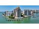 Waterfront building features a pool, boat docks, and spectacular views at 420 Golden Gate Pt # 200A, Sarasota, FL 34236