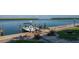 Beautiful waterfront view with a private boat dock, boat, and easy access to the open water at 4420 Exeter Dr # L104, Longboat Key, FL 34228