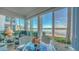 Beautiful water views seen from enclosed lanai with seating at 4420 Exeter Dr # L104, Longboat Key, FL 34228