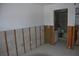 Bathroom during renovation shows bare walls with access to the shower and vanity area at 4621 Gulf Of Mexico Dr # 2F, Longboat Key, FL 34228