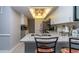 Modern kitchen with granite countertops, stainless steel appliances, and ample cabinet space at 4621 Gulf Of Mexico Dr # 2F, Longboat Key, FL 34228