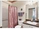 Well-lit bathroom featuring a shower, vanity, and coordinated decor with neutral walls at 4802 51St W St # 1711, Bradenton, FL 34210