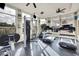 Bright fitness center with cardio machines, weight training, ceiling fans and large windows at 4802 51St W St # 1711, Bradenton, FL 34210