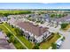 Aerial view of the townhomes, showcasing the community layout and landscaping at 5007 Sunnyside Ln, Bradenton, FL 34211