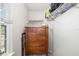 Walk-in closet provides ample storage space, featuring built-in shelves for organization and convenience at 5007 Sunnyside Ln, Bradenton, FL 34211