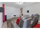 Comfortable theater room with reclining chairs, surround sound system, and plush carpeting at 5033 Brickwood Rise Dr, Wimauma, FL 33598