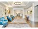 Elegant lobby featuring stylish seating, hardwood floors, and decorative accents at 52 Grande Fairway, Englewood, FL 34223