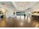 Expansive lobby featuring hardwood floors, elegant decor, and ample space for gatherings at 52 Grande Fairway, Englewood, FL 34223