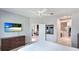 Spacious bedroom with access to the en-suite bathroom and adjacent living area at 5450 Fairfield Blvd, Bradenton, FL 34203