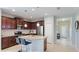 Modern kitchen with granite countertops, stainless steel appliances, and convenient bar seating at 5450 Fairfield Blvd, Bradenton, FL 34203