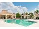Enjoy the multiple amenities in the community pool area with an outdoor kitchen and covered lounging area at 5450 Fairfield Blvd, Bradenton, FL 34203