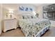 Bedroom with large, comfortable bed and bright natural light from the window at 5624 Palmer Cir # 101, Bradenton, FL 34211
