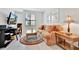 Cozy living room featuring a comfortable sofa, a desk area, and decoratively designed tables at 5624 Palmer Cir # 101, Bradenton, FL 34211
