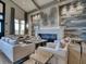 Modern lounge area with a fireplace, comfortable sofas, and stylish interior design at 5624 Palmer Cir # 101, Bradenton, FL 34211