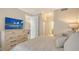 Inviting main bedroom featuring a dresser with a TV, providing ample storage and entertainment at 606 Riviera Dunes Way # 306, Palmetto, FL 34221