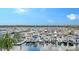 Scenic view of the marina filled with boats, highlighting waterfront living opportunities at 606 Riviera Dunes Way # 306, Palmetto, FL 34221