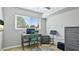 Study room has sleek desk, chair and neutral paint, with natural lighting at 6423 Georgia Ave, Bradenton, FL 34207