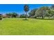A large green area within the community, perfect for outdoor activities at 6462 Draw Ln # 72, Sarasota, FL 34238