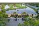 Spacious condo complex with convenient parking, lush landscaping, and a serene atmosphere, ideal for comfortable living at 6999 W Country Club N Dr # 224, Sarasota, FL 34243
