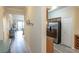 Inviting hallway leading to the kitchen and the living room at 7005 River Hammock Dr # 204, Bradenton, FL 34212
