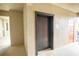 Hallway providing access to a convenient elevator in a residential building, offering easy accessibility at 7005 River Hammock Dr # 204, Bradenton, FL 34212