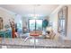 Open-concept living area with granite countertops and natural light at 7005 River Hammock Dr # 204, Bradenton, FL 34212