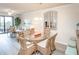 Inviting dining area with plenty of seating and natural light at 7005 River Hammock Dr # 204, Bradenton, FL 34212