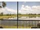 Relax and enjoy gorgeous lake views from this screened-in outdoor lanai at 7005 River Hammock Dr # 204, Bradenton, FL 34212